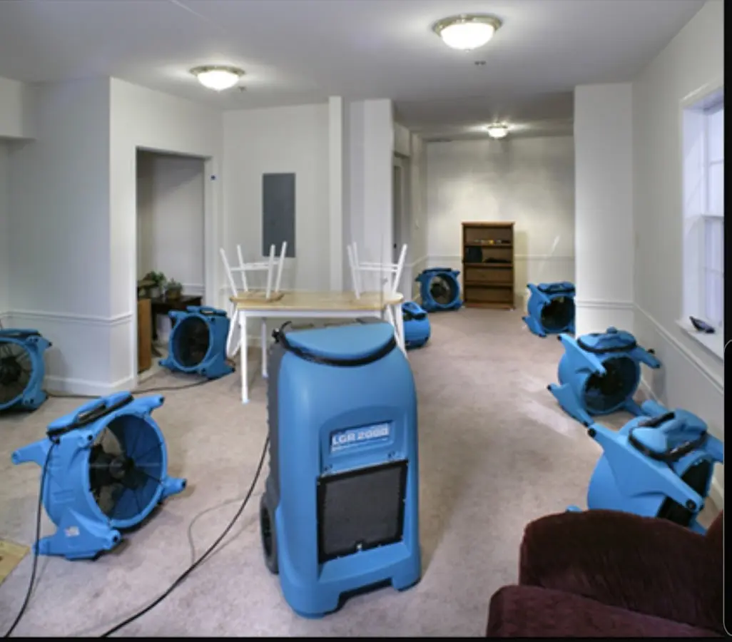 Air movers and dehumidifier setup for Water Damage Restoration in Triana